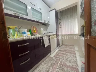 SABRİ PINARBAŞI'dan ALTINOLUK MERKEZ'de SATILIK KALORİFERLİ ARAKAT 2+1 DAİRE