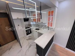 SABRİ PINARBAŞI'dan AKÇAY MERKEZ'de SATILIK FULL YAPILI 2+1 DAİRE