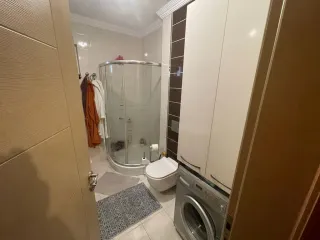 SABRİ PINARBAŞI'dan AKÇAY MERKEZ'de ŞÖMİNELİ SATILIK 2+1 DAİRE