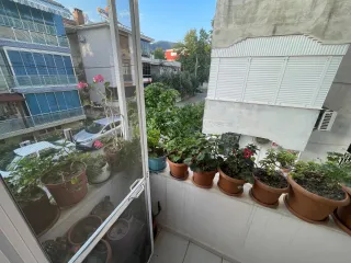 SABRİ PINARBAŞI'dan ALTINOLUK MERKEZ'de SATILIK KALORİFERLİ ARAKAT 2+1 DAİRE